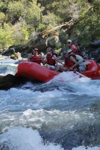 4 people rafting